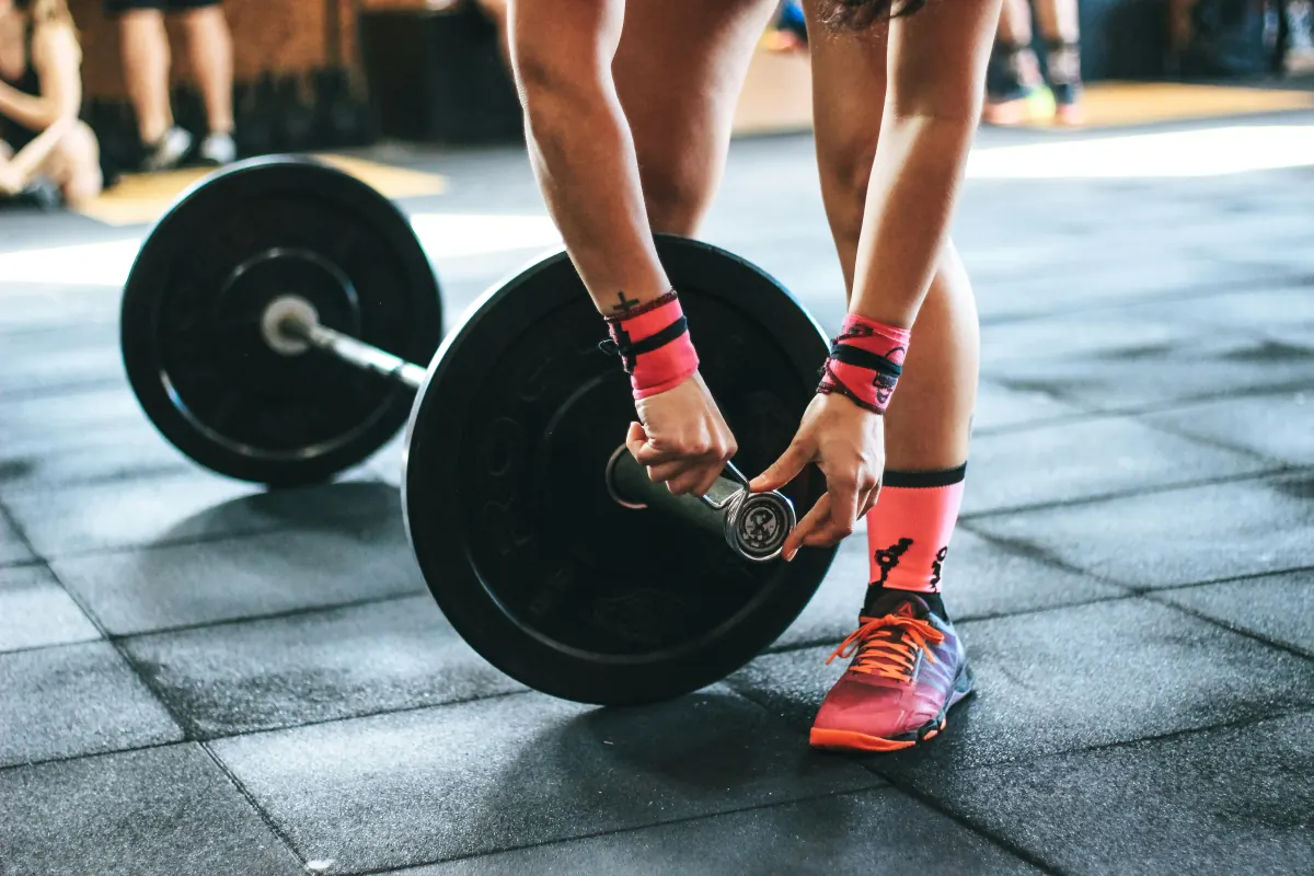 Gym training with barbell